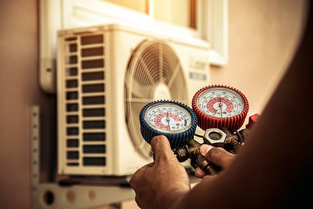Professional Heat Pump Repair technician working in Cambria, WI